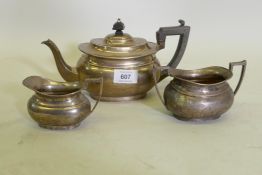 A three piece silver tea set, London 1913, Horace Woodward & Co, 662g