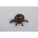 A Japanese style bronze okimono ladybird, 3cm