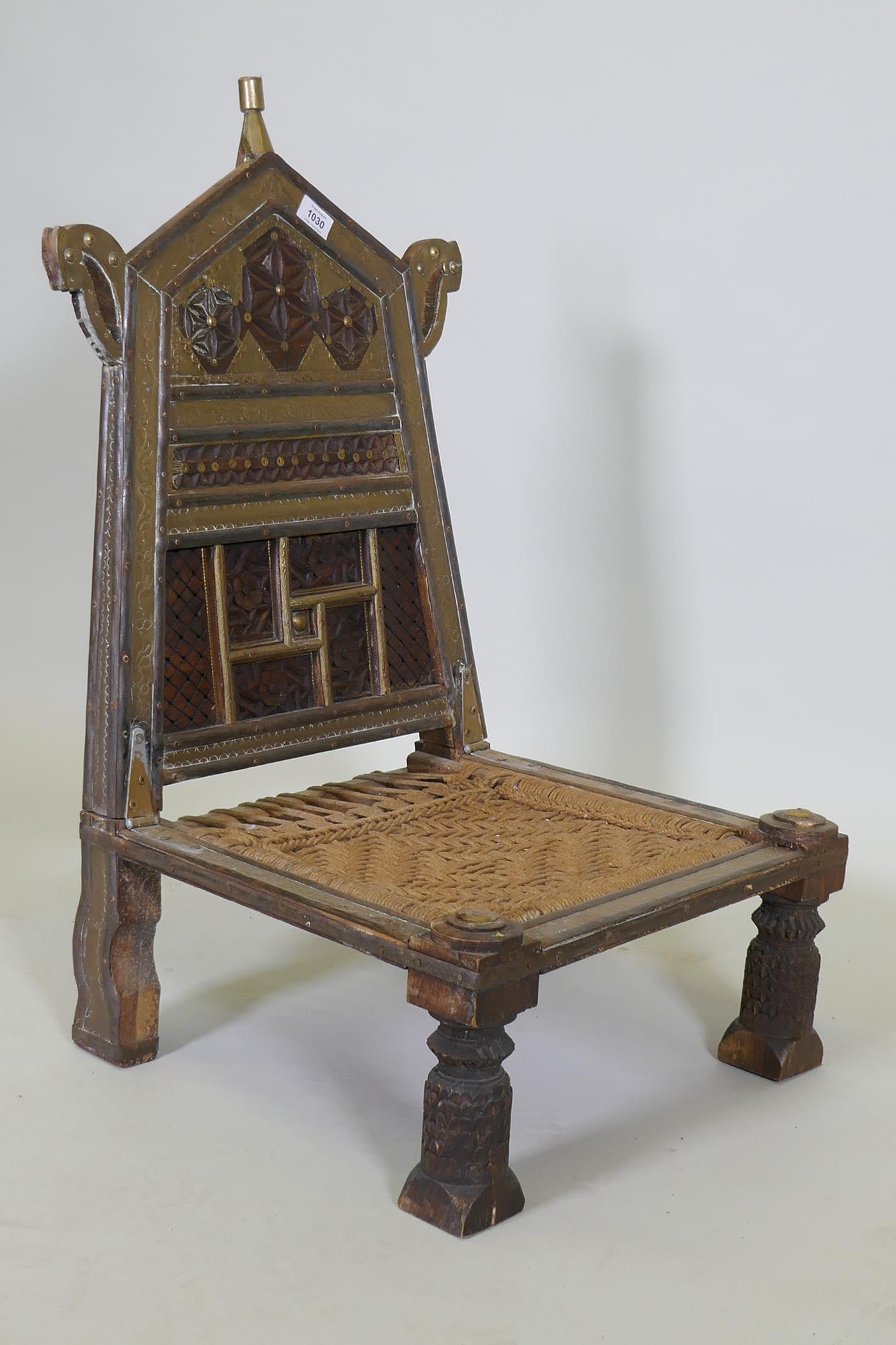 An antique Indian Pidha low chair with folding back, brass and iron mounts and webbed seat - Image 3 of 4