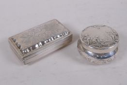 A C19th Dutch silver snuff box with raised decoration of Putti at play, export marks and English