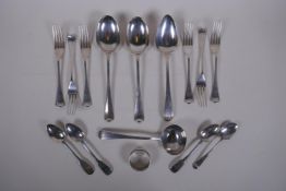 A collection of antique silver flatware, mostly C19th, including six forks, mustard spoon, serving