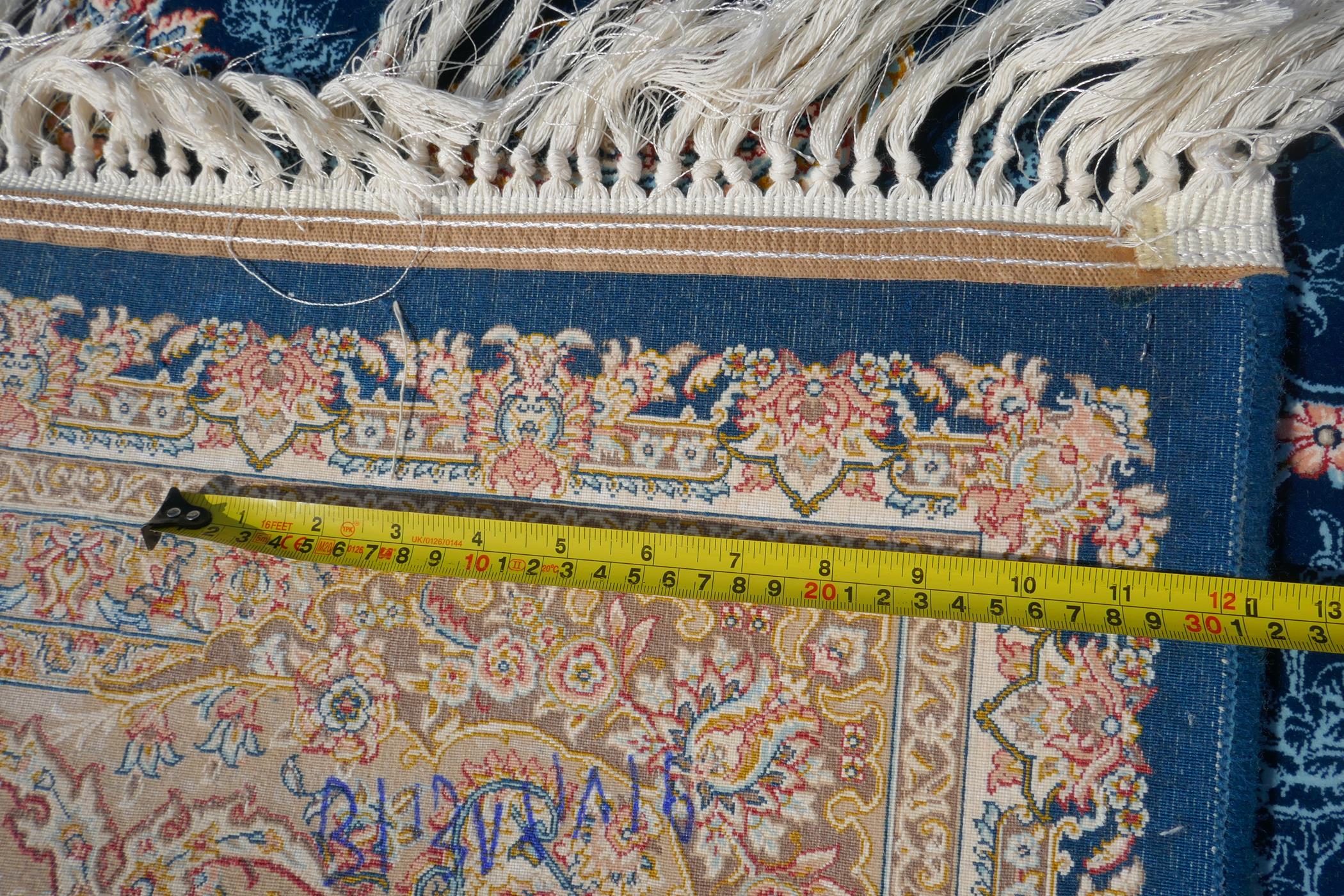 A fine woven blue and cream ground Persian carpet full pile with traditional allover floral - Image 5 of 5