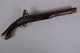 A late C18th flintlock pistol, inscribed on the barrel Robert Wogdon, London, the round barrel