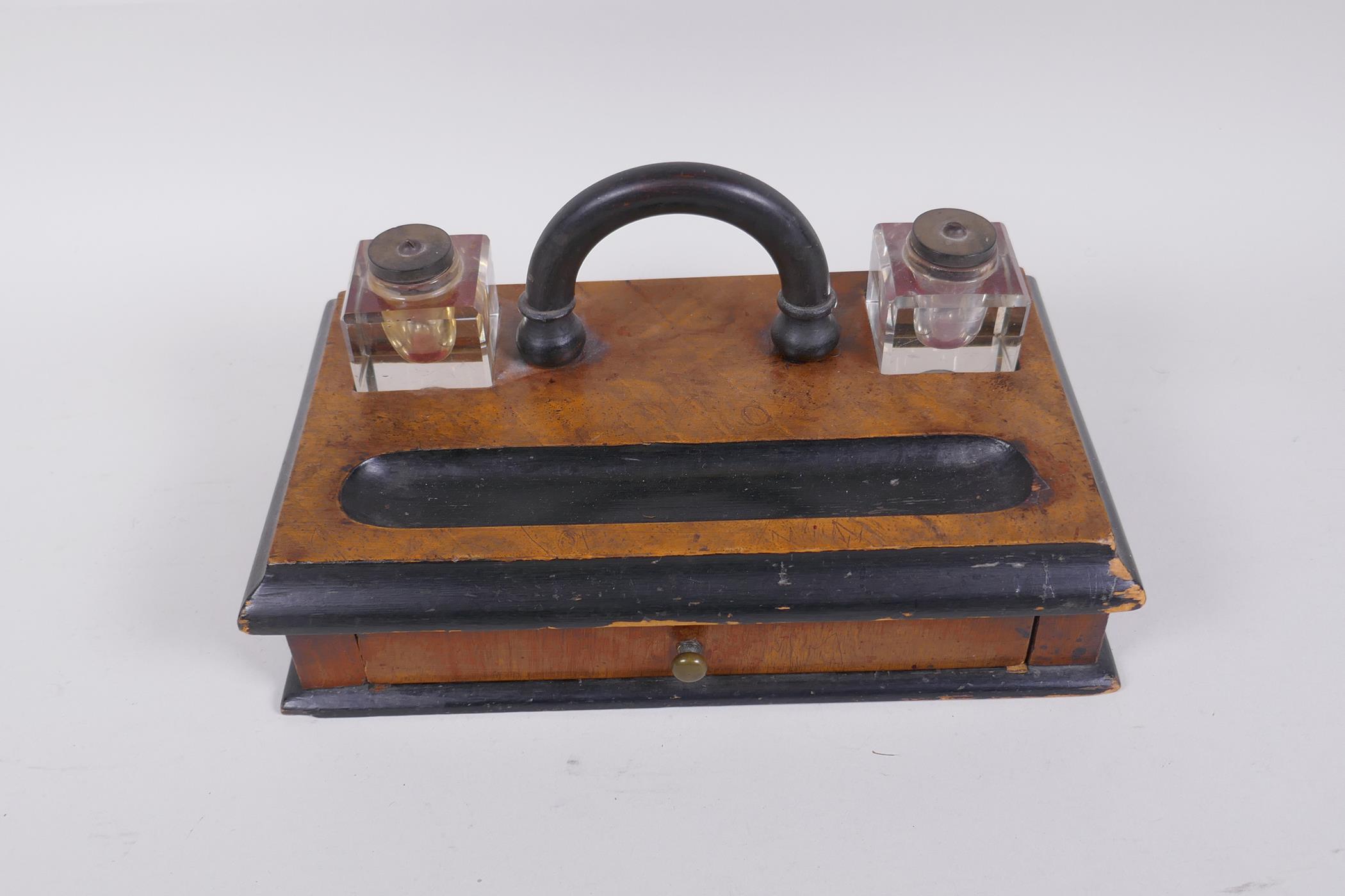 An antique ebonised walnut desk set with twin glass ink wells and a single drawer, 28 x 16cm - Image 2 of 3