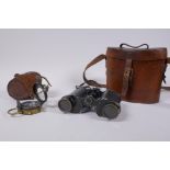 A pair of WWI binoculars with leather case, and a British Army WWI Verners Mk. VII marching