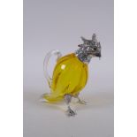 A silver plated and yellow glass cockatoo claret jug, 15cm high