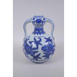 A blue and white porcelain two handled garlic head shaped vase with floral decoration, Chinese