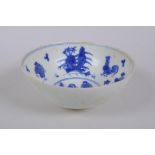 A Chinese blue and white porcelain rice bowl with chicken decoration to the bowl, the exterior