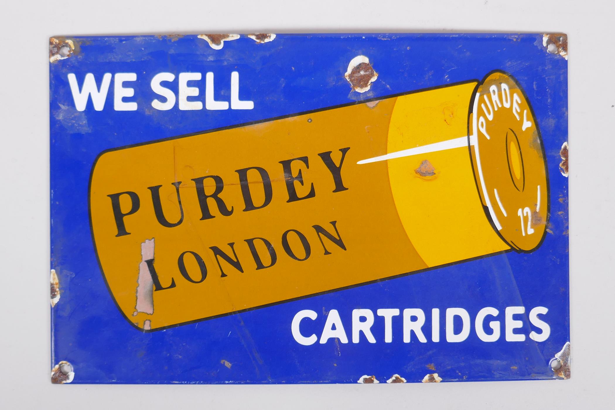 A vintage style Purdy Cartridges enamel advertising sign, 30 x 20cm