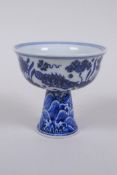 A Chinese blue and white porcelain stem cup decorated with carp in a lotus pond, Xuande 6