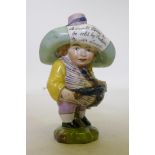 A porcelain Mansion House dwarf, wearing a hat inscribed A Small Farm to be Sold by Auction by Mr.