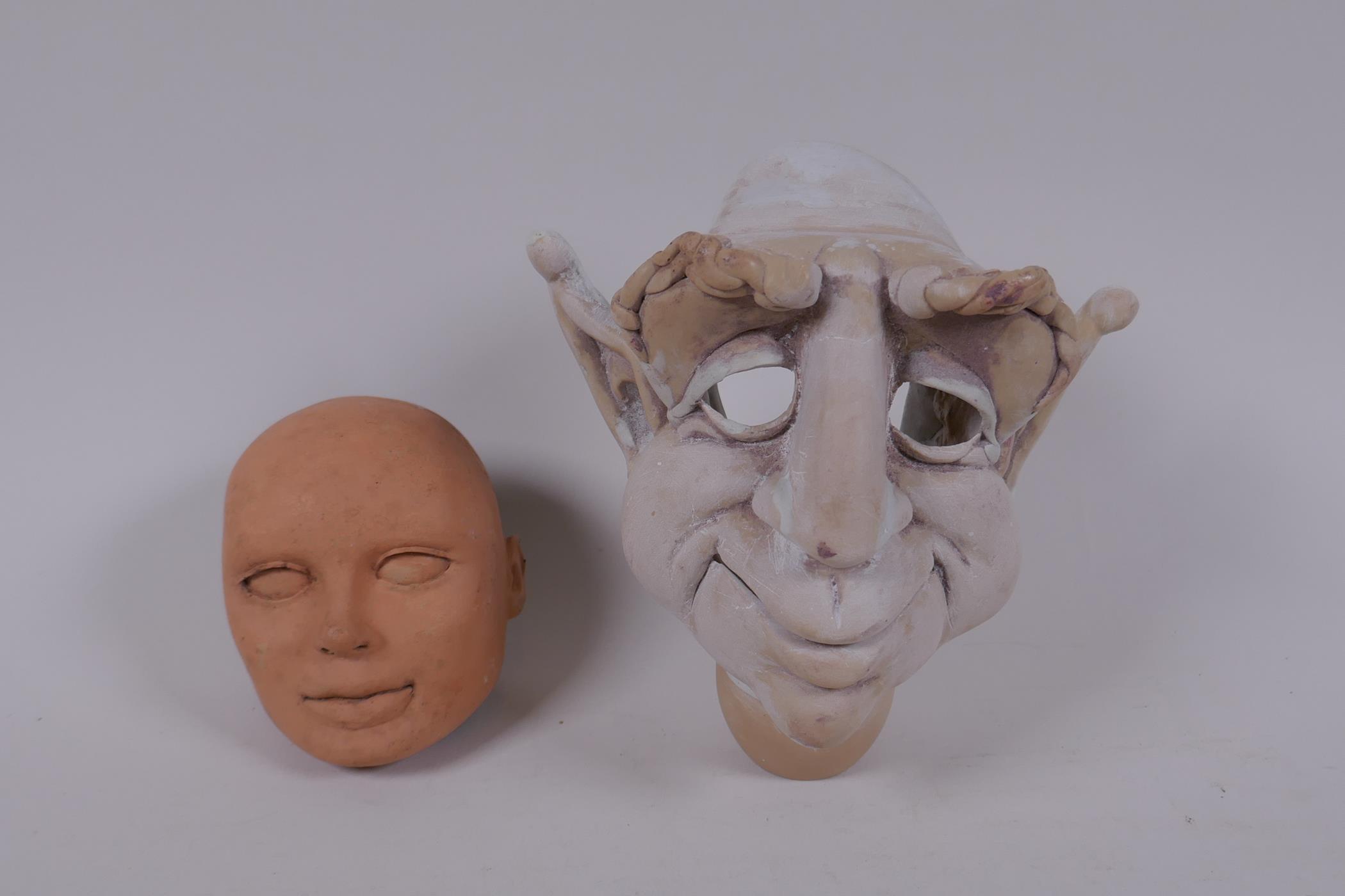 Two puppet heads/maquettes by Phil Eason, largest 15cm