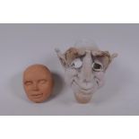 Two puppet heads/maquettes by Phil Eason, largest 15cm