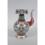 A Chinese polychrome porcelain teapot and cover decorated with the eight Buddhist treasures and