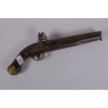 A late C18th/early C19th flintlock pistol, barrel 23cm long, the lock stamped Tower on a crown