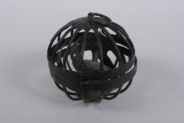 An C18th/C19th wrought iron ships gimbal oil lamp, 12cm diameter