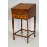 An antique parquetry inlaid child's bureau, with two drawers and a fitted interior, adapted, 44 x