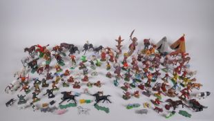 A large quantity of vintage plastic and metal 'cowboy and Indian' toy figures, various makers