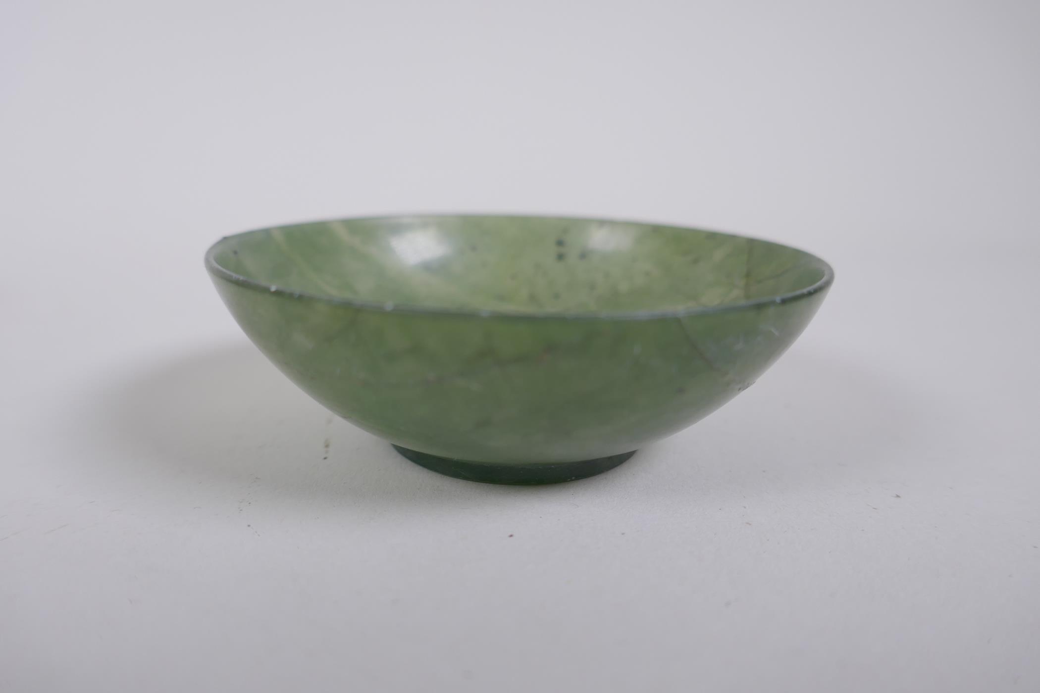 Four Chinese spinach jade bowls, AF repairs, 7cm diameter - Image 3 of 8