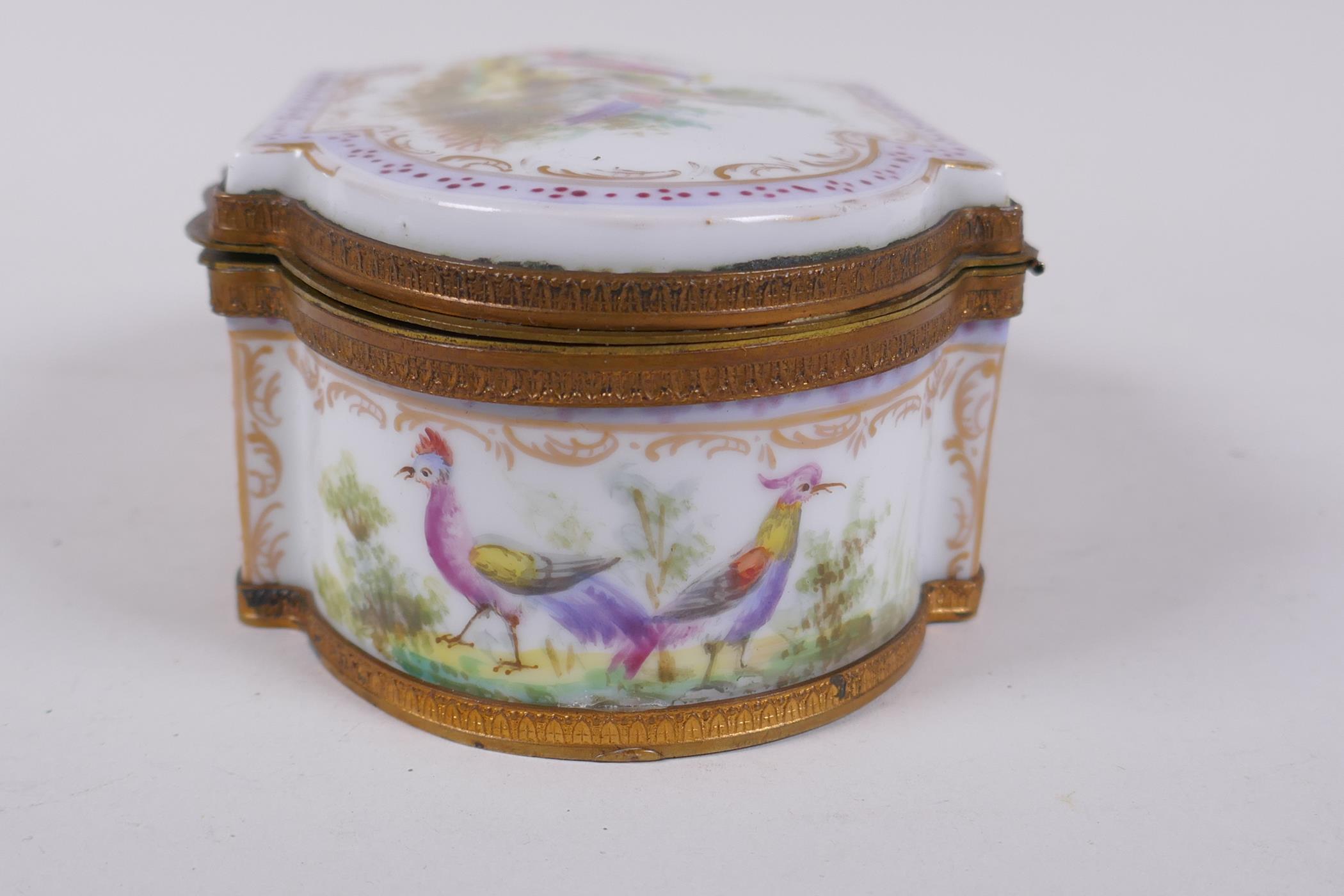 A hand painted porcelain trinket box with ormolu mounts, bears red Sevres mark to base, 16 x 10cm, - Image 4 of 8