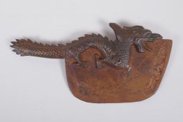 A Tibetan bronze ritual chopper with dragon form handle, 33cm long