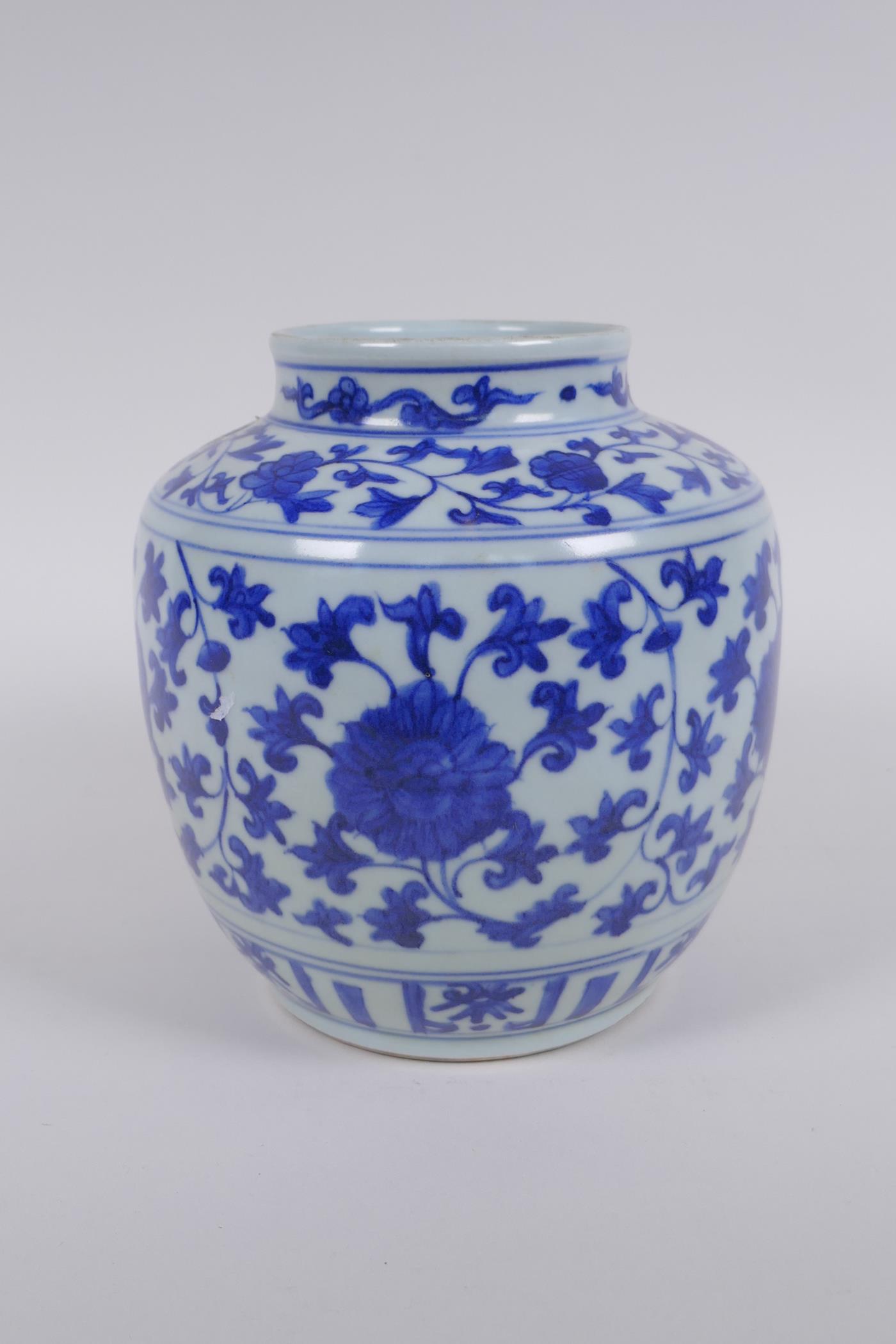 A Chinese blue and white porcelain jar with scrolling lotus flower decoration, 17cm high - Image 2 of 5