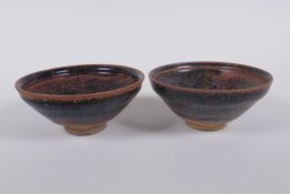 A pair of Chinese Cizhou kiln tea bowls, 10 cm diameter