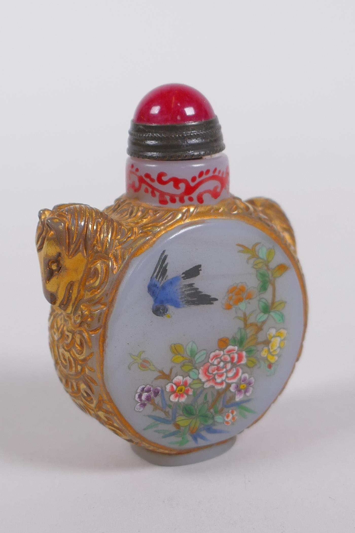 A Peking glass snuff bottle with carved and gilt horse decoration, the side panels with polychrome - Image 3 of 4