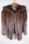 A vintage lady's short fur cape