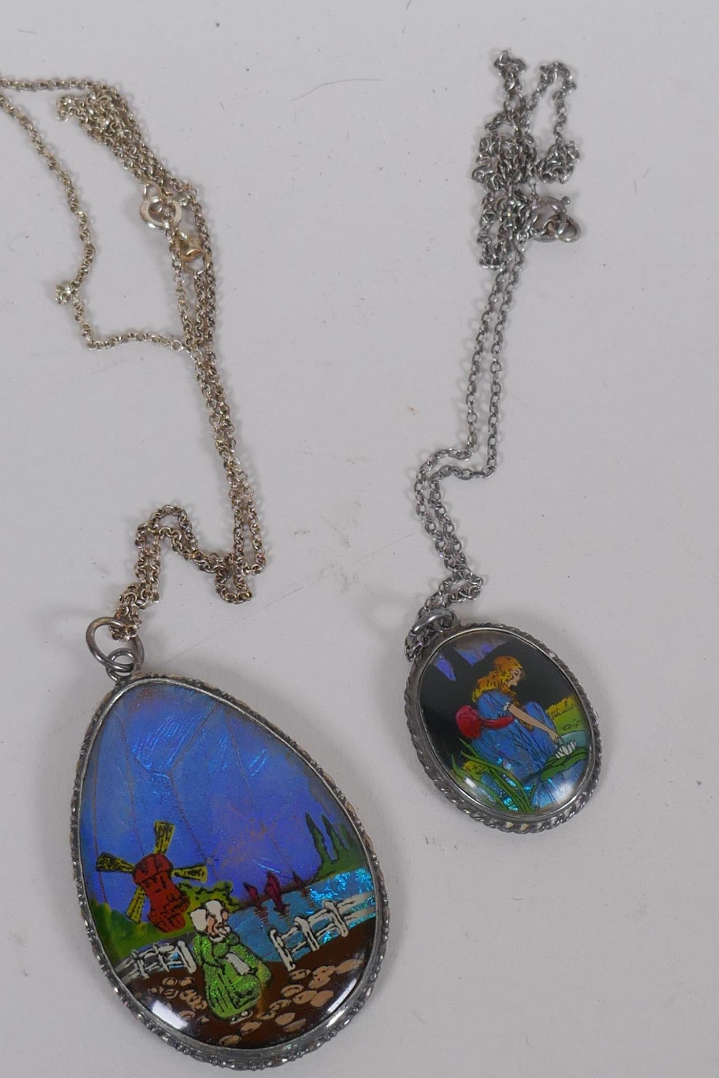 An antique silver pendant with enamelled butterfly wing decoration, 5cm long, and another similar - Image 2 of 2