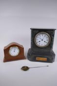 A C19th marble and slate mantel clock, the enamel dial with Roman numerals, the French movement