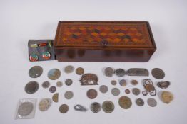 An antique parquetry inlaid box, containing a quantity of dectorist finds including coins, brooches,