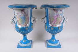 A pair of Sevres style porcelain two handled urns with decorative panels depicting classical maidens