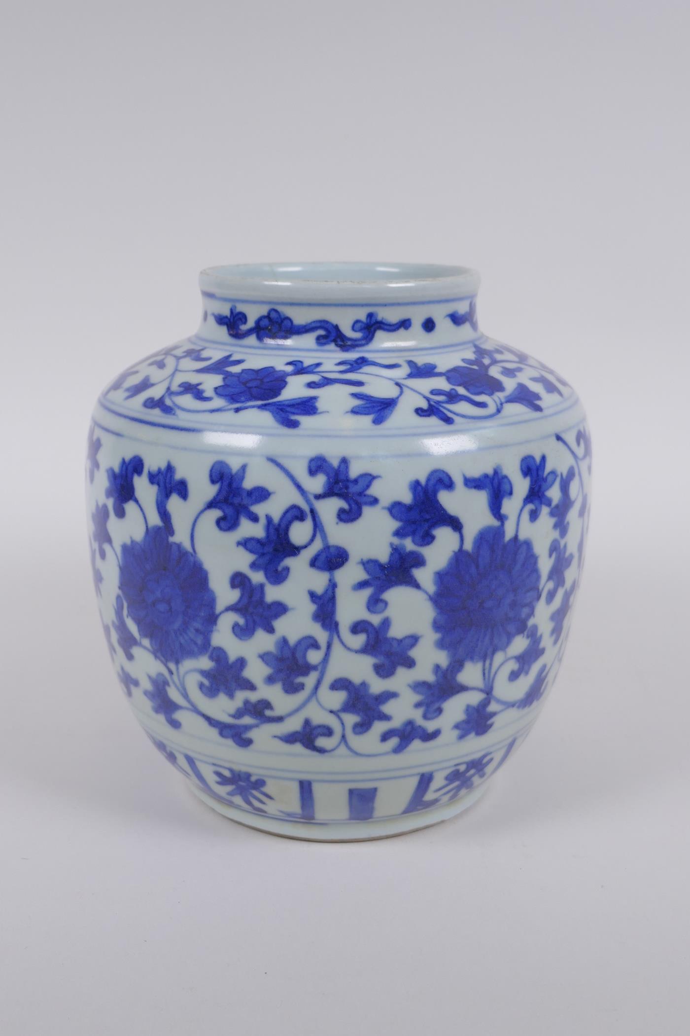 A Chinese blue and white porcelain jar with scrolling lotus flower decoration, 17cm high - Image 3 of 5