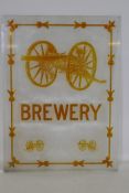 An etched engraved,cut and coloured glass pane from The Canon Brewery, Brighton, the decoration