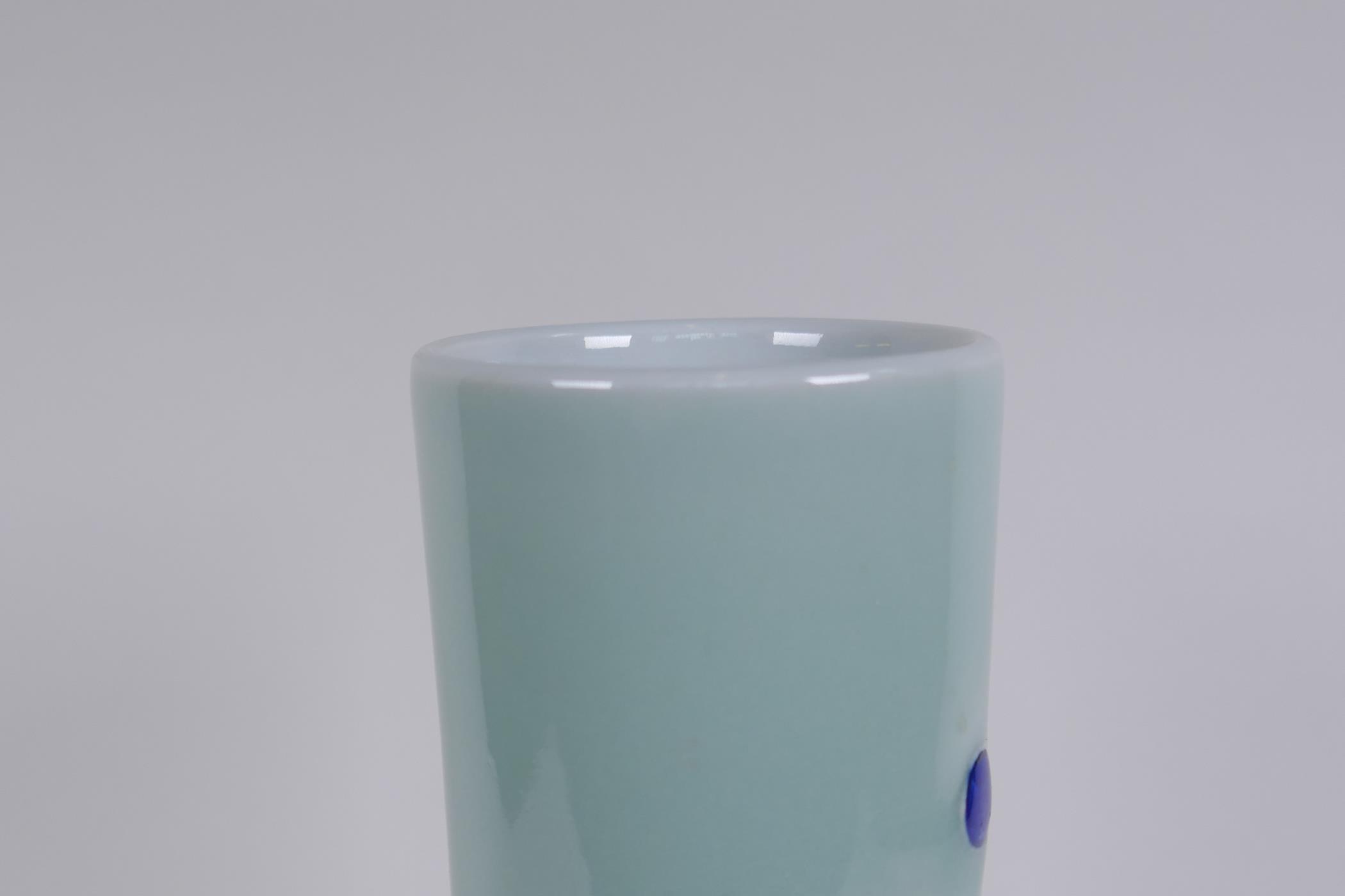 A Chinese celadon ground porcelain bottle vase with raised blue and white kylin decoration, 35cm - Image 5 of 6