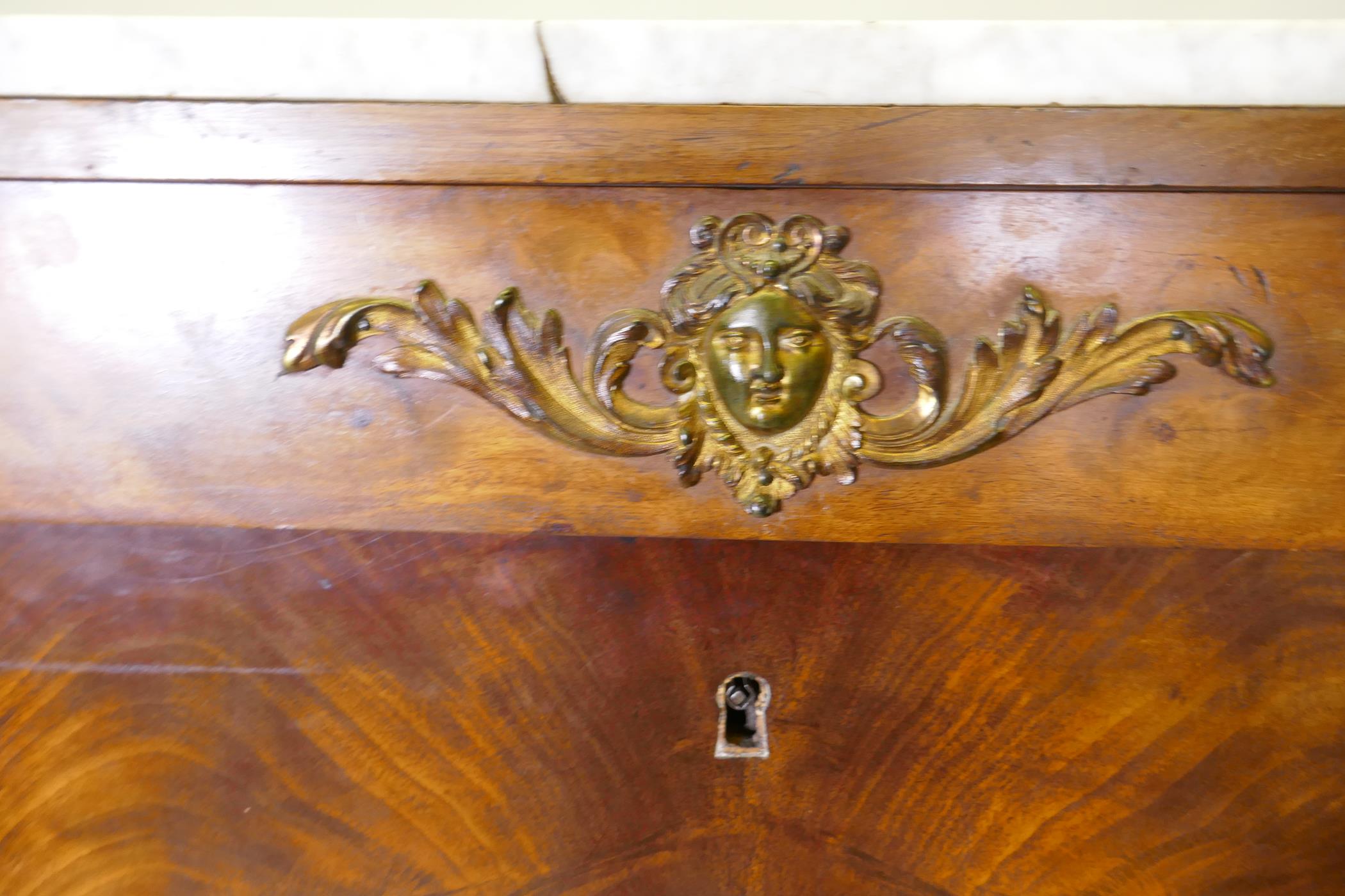 A C19th continental figured mahogany secretaire a abattant with ormolu mounts and marble top over - Image 4 of 6
