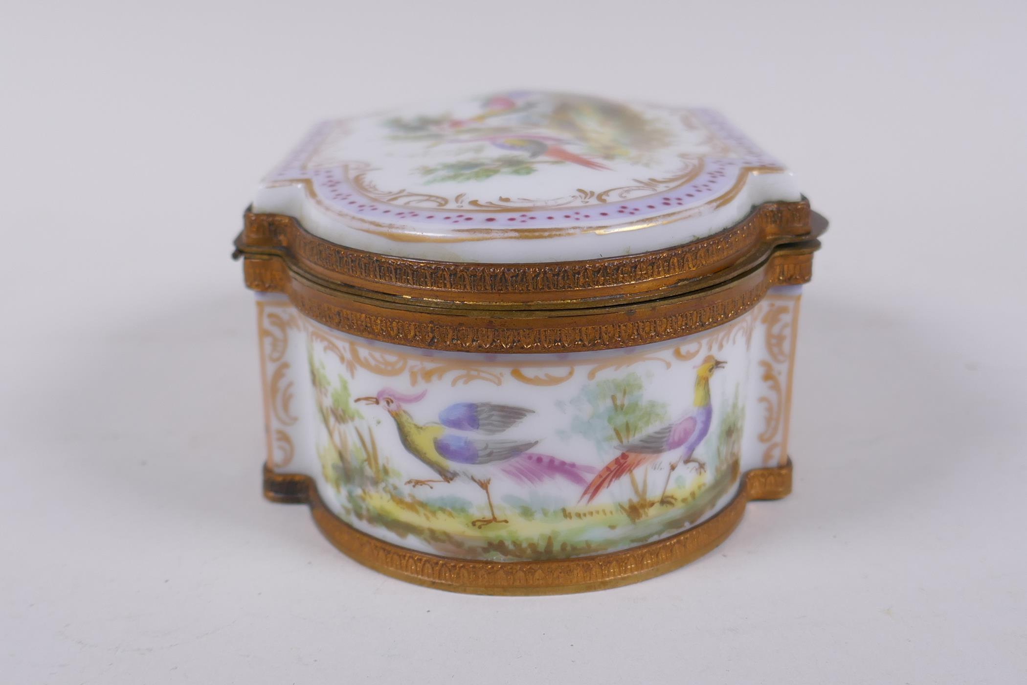 A hand painted porcelain trinket box with ormolu mounts, bears red Sevres mark to base, 16 x 10cm, - Image 6 of 8