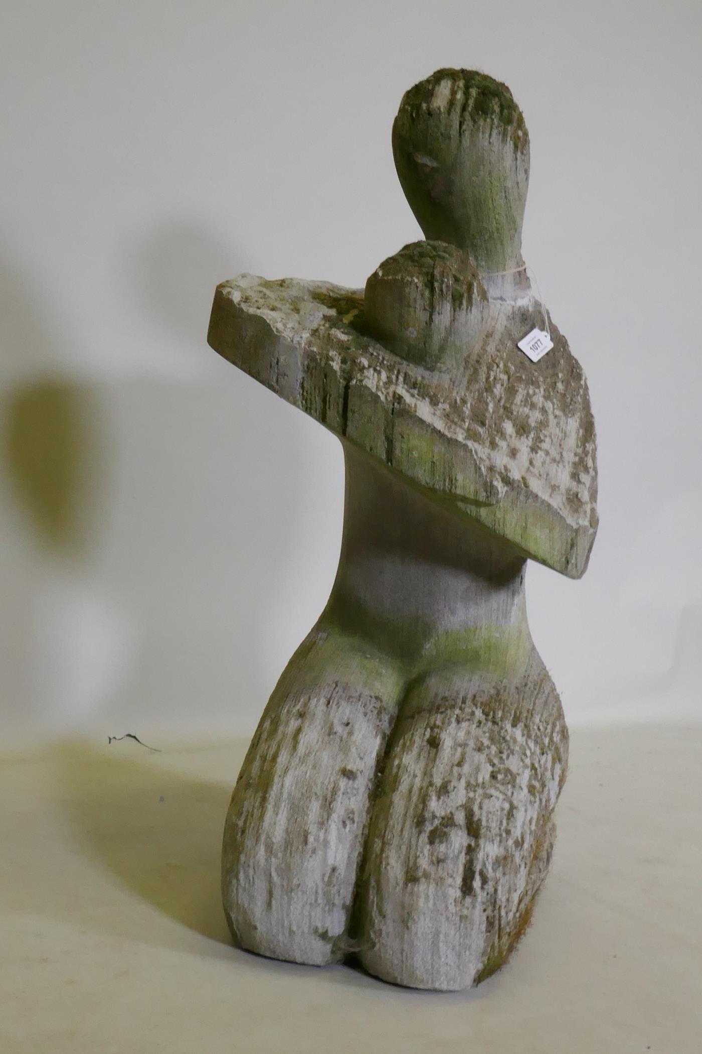 A stylised carved stone figure of a kneeling mother and child, AF, 79cm high - Image 3 of 4