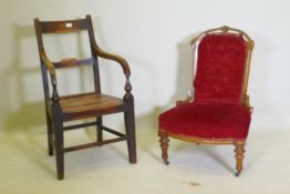 A Victorian carved walnut nursing chair, AF, and a C19th beechwood and elm open arm chair