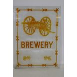 An etched engraved,cut and coloured glass pane from The Canon Brewery, Brighton, the decoration