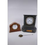 A C19th marble and slate mantel clock, the enamel dial with Roman numerals, the French movement
