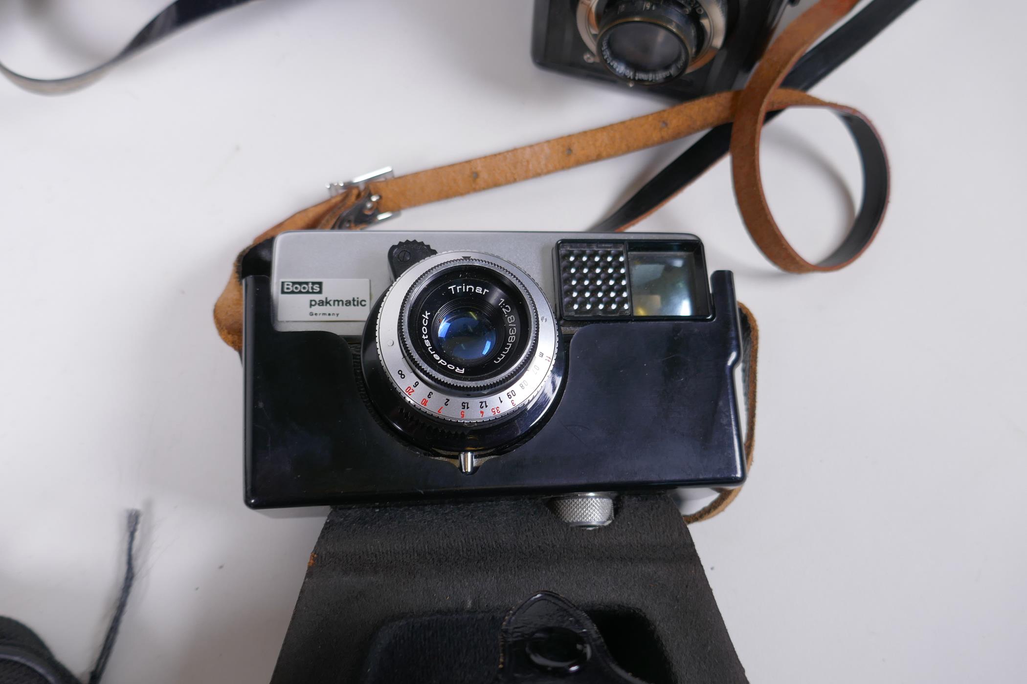 Three vintage medium format film cameras including two Voigtlander Brilliant Compur and Lubitel 2, a - Image 5 of 9