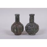 A pair of antique Persian carved hardstone scent bottles, 7cm high