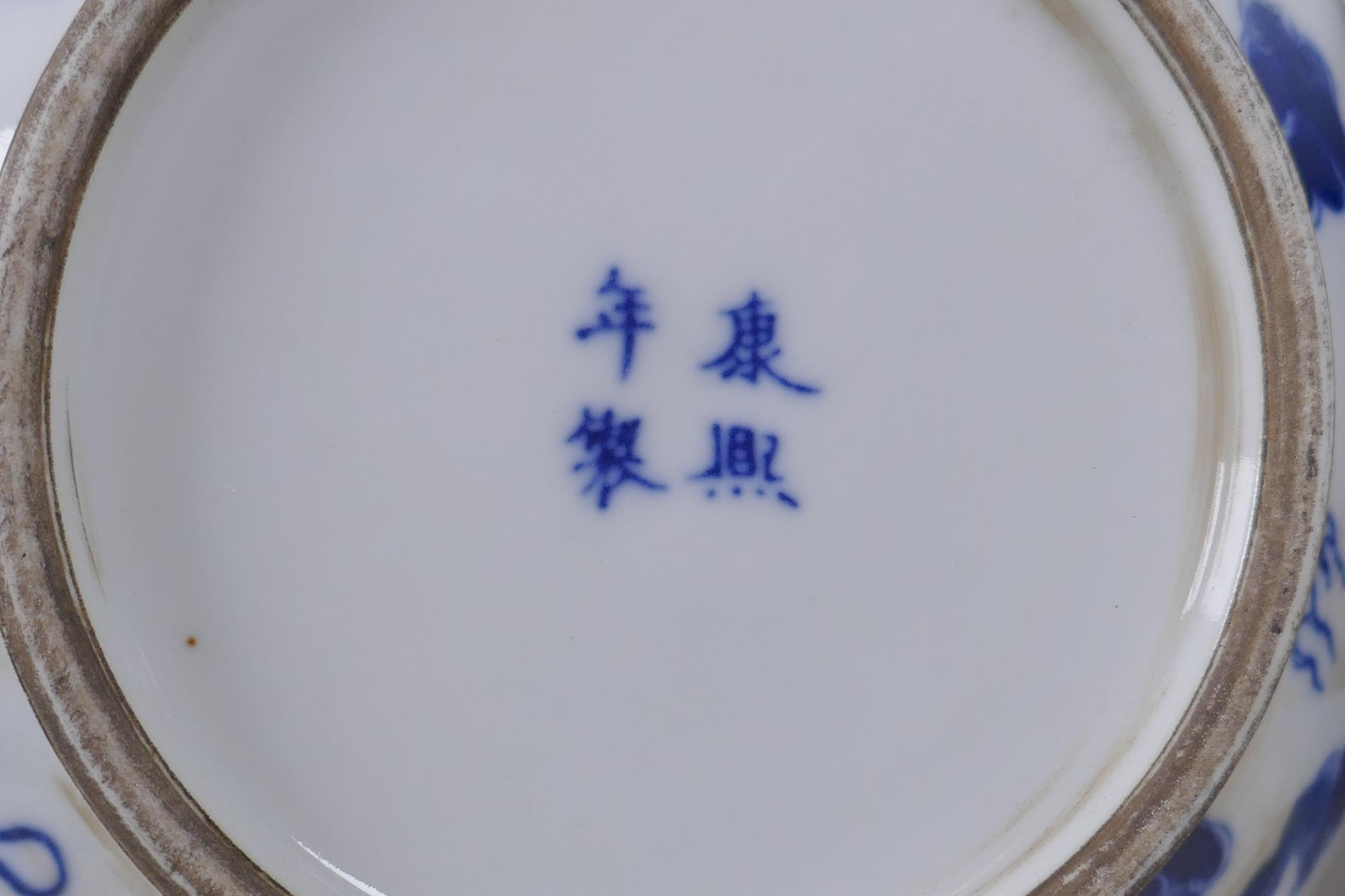 A pair of blue and white porcelain vases with dragon decoration, on carved hardwood stands, - Image 3 of 3