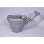 A vintage galvanised watering can, 39cm high