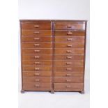 A mid century mahogany filing cabinet comprising 22 slide drawers, 80 x 37 x 90cm