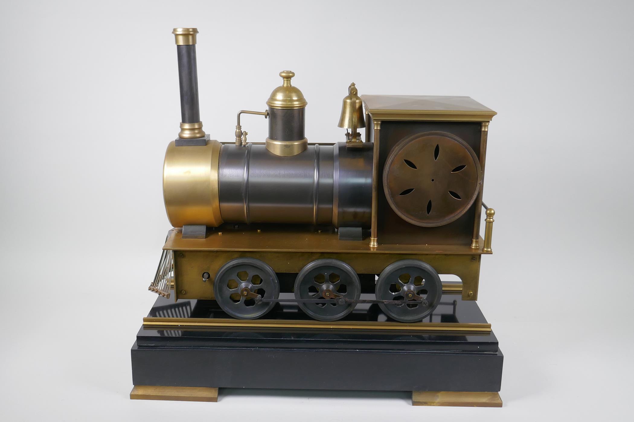 A French style bronze and brass automaton locomotive clock, 47cm long, 45cm high - Image 6 of 8