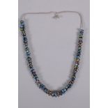 A Venetian glass eye bead necklace, 64cm long