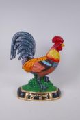 A painted cast iron cockerel door stop, 34cm high